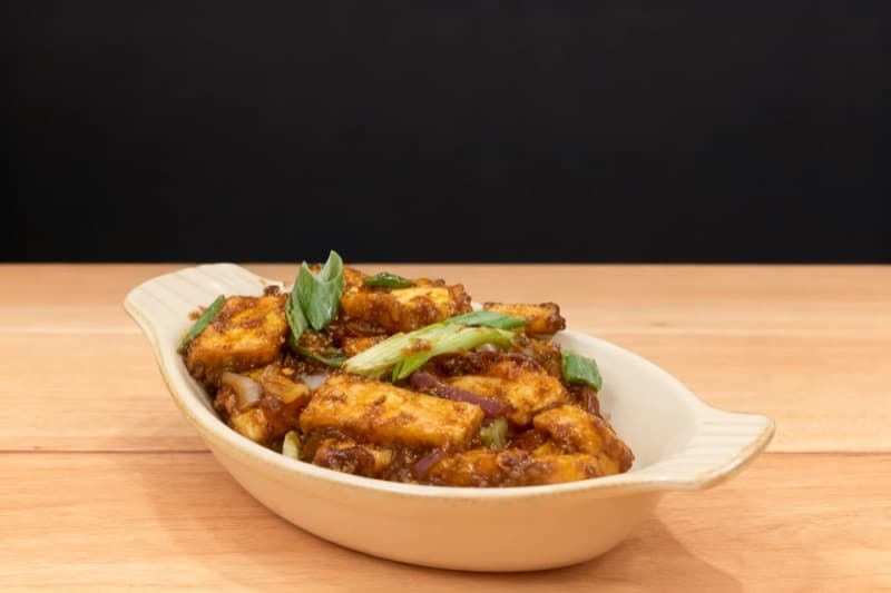 After: Paneer transformed from restaurant clutter to clean wood surface
