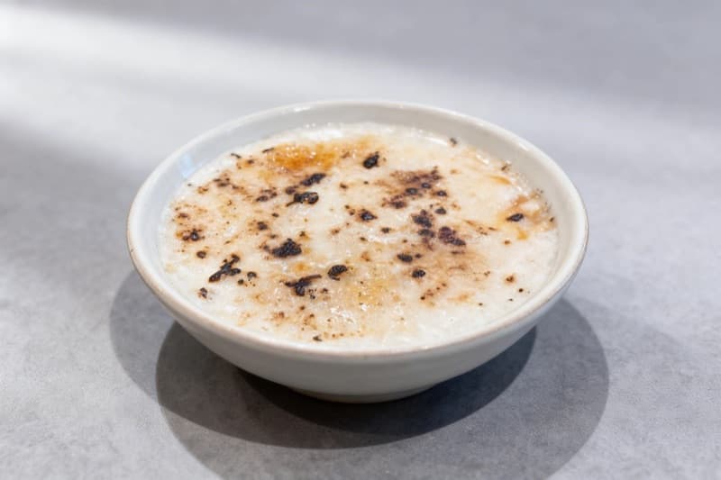 AI-enhanced rice pudding on concrete surface