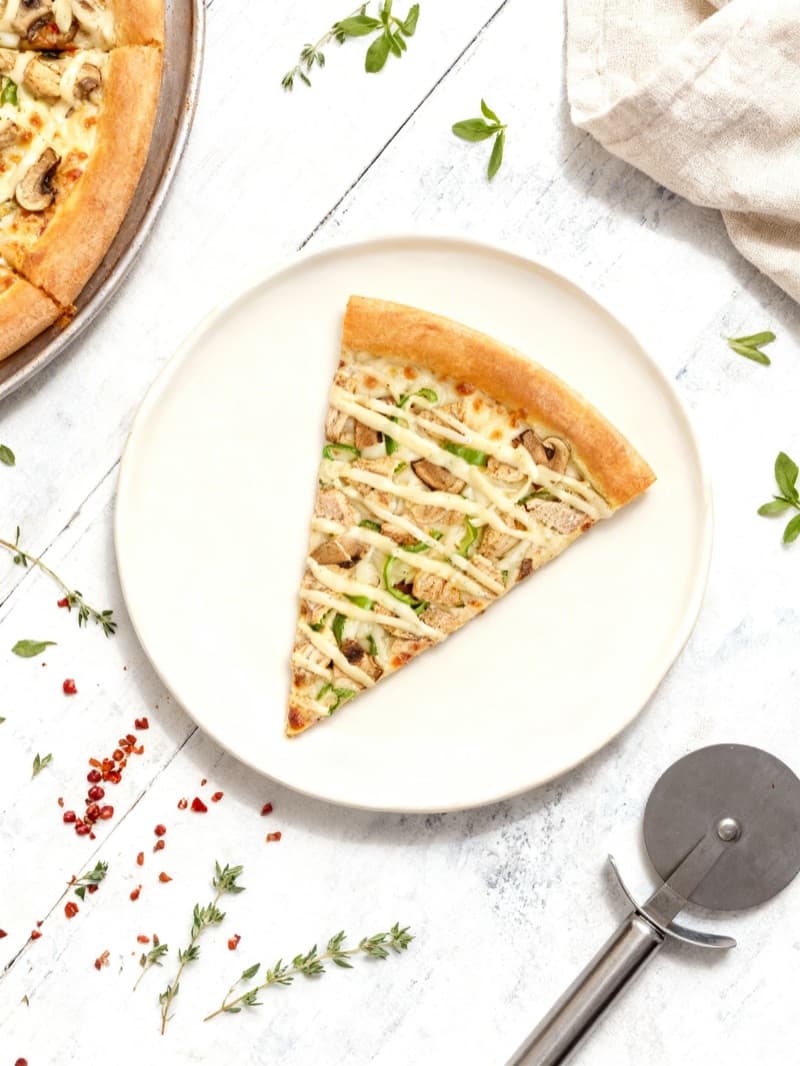 After: Pizza slice with chicken and peppers